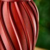 Ira Vase – Dark Red Detail Close-up of the Ira vase's spiralling fluted surface in dark red