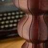 Close-up of the Selini vase's bulbous curves in brown