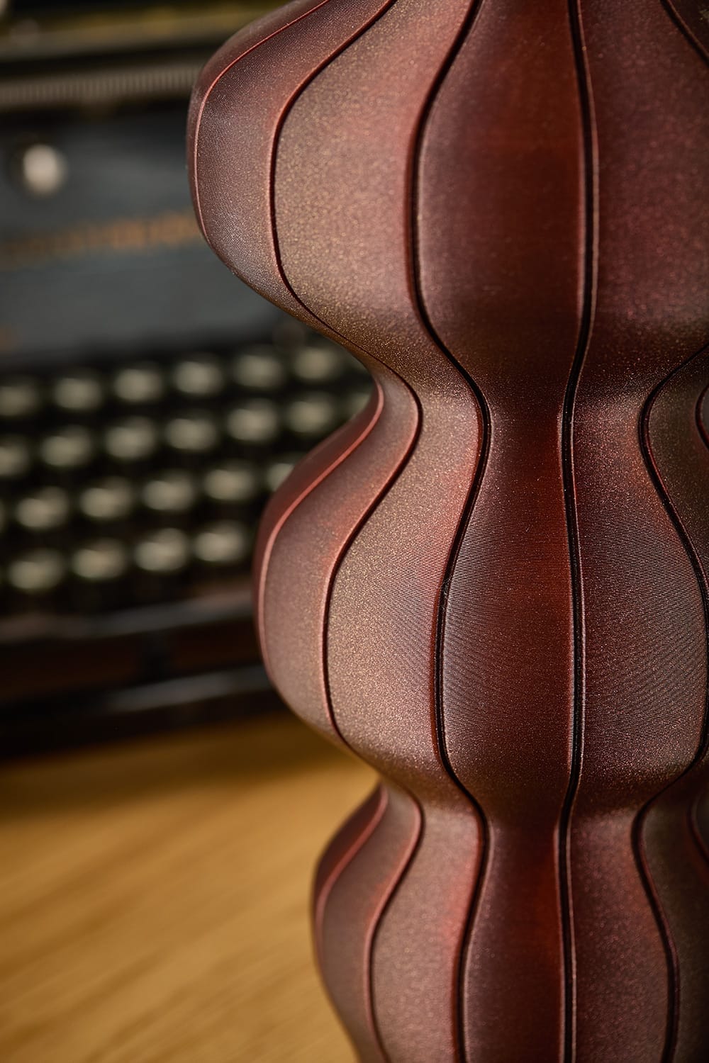Close-up of the Selini vase's bulbous curves in brown